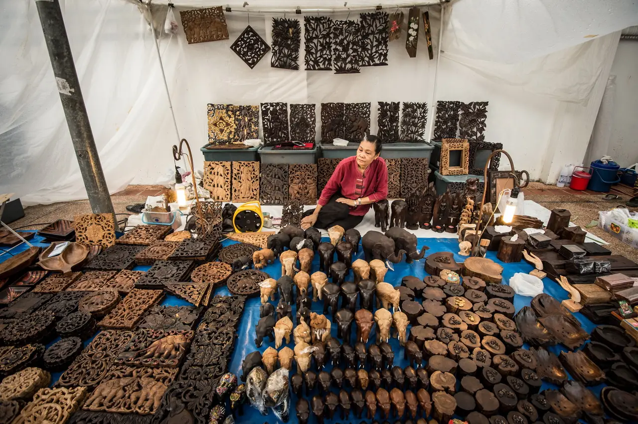 A carved wood and stamp stall on the Tha Phae walking street