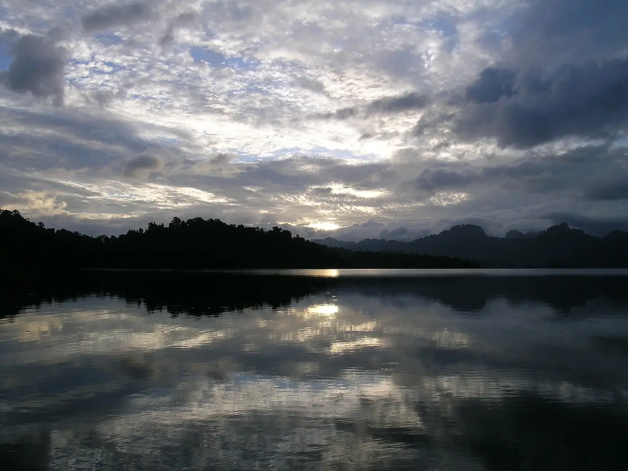 A view over Khao Sok National Park from a kayak or boat on the water
