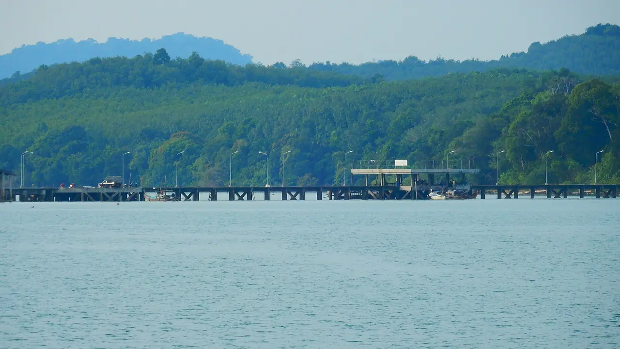 Wooded shoreline and a jetty on Koh Yao Noi in December 2014