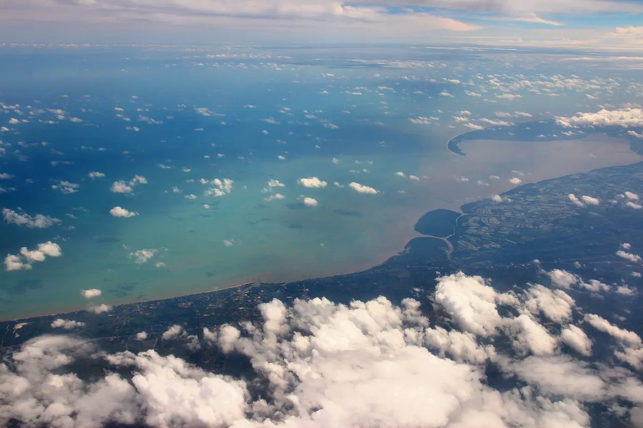 Aerial view of the coast and Cape Talumphuk on the Gulf of Thailand, near Pak Phanang