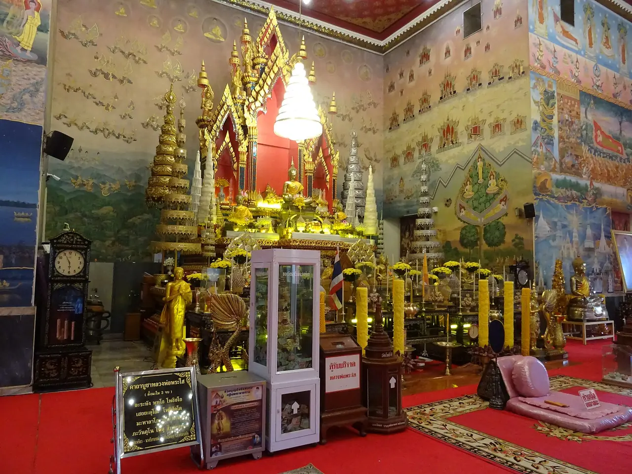 The Luang Pho Phra Sai shrine and murals inside Wat Pho Chai, Nong Khai