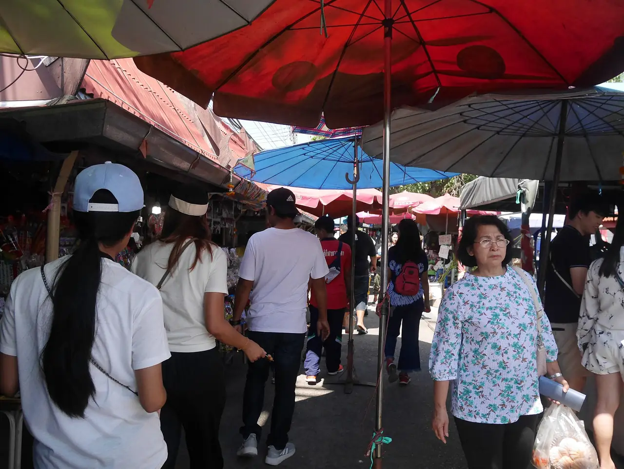 A busy market lane on Ko Kret