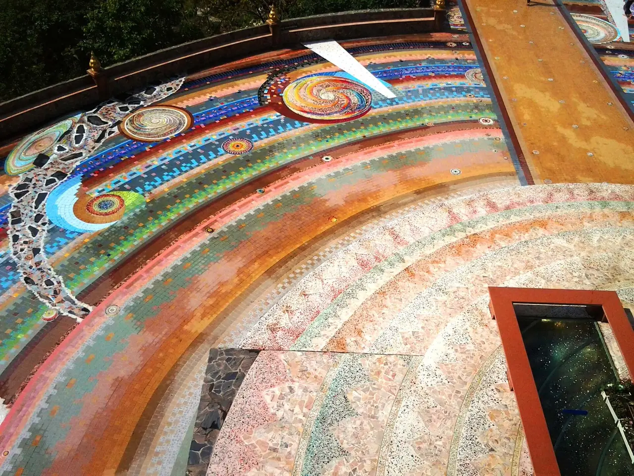 A colourful mosaic terrace at Wat Phra That Pha Son Kaew in Khao Kho