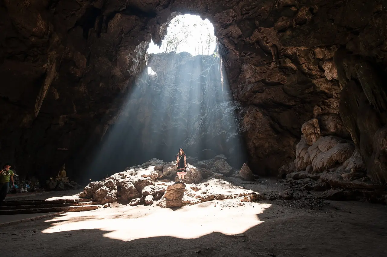 Sunlight falling through the roof opening of Khao Luang cave near Phetchaburi