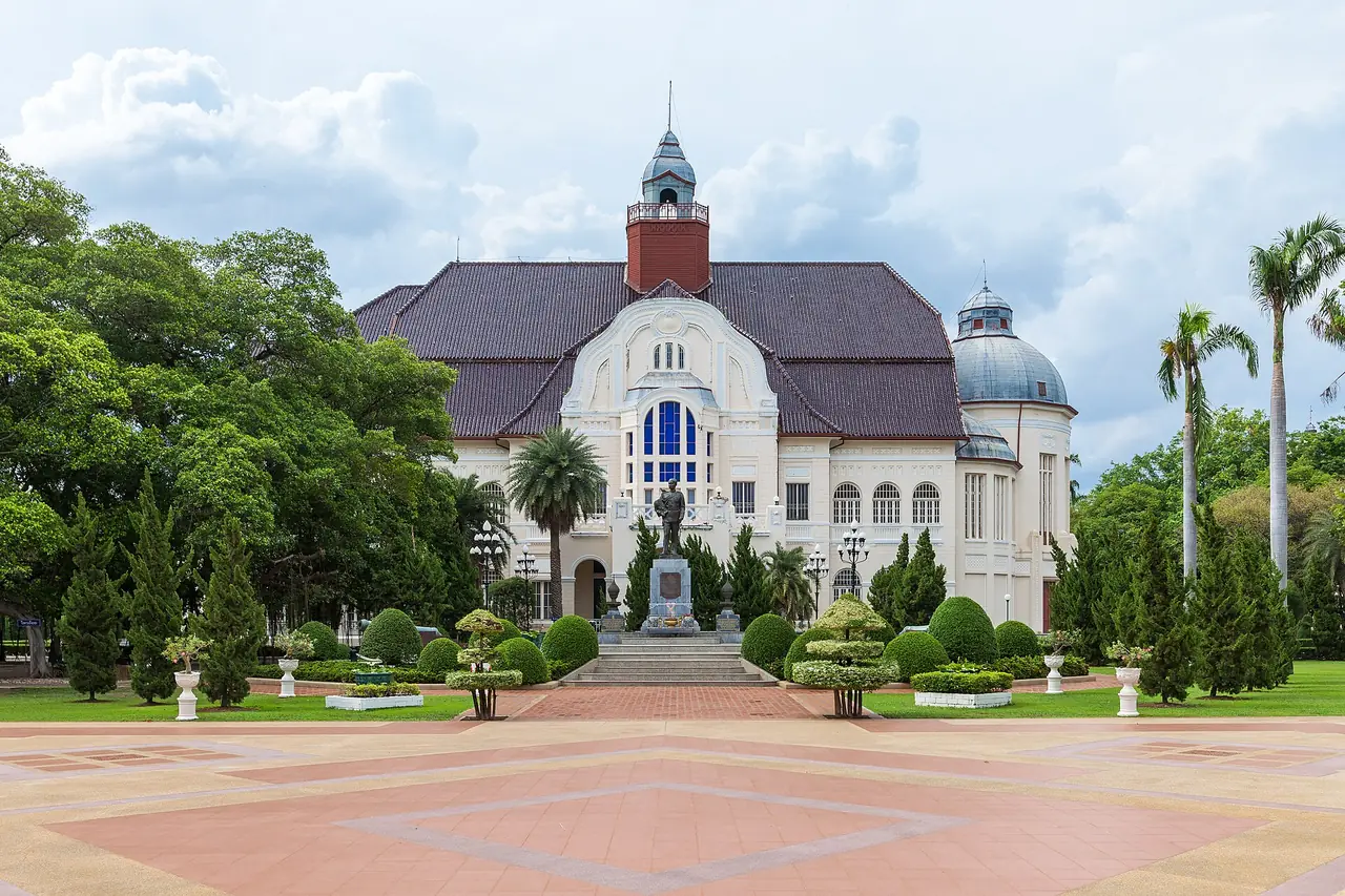 The main building of Phra Ram Ratchaniwet palace in Phetchaburi with its fountain and lawn
