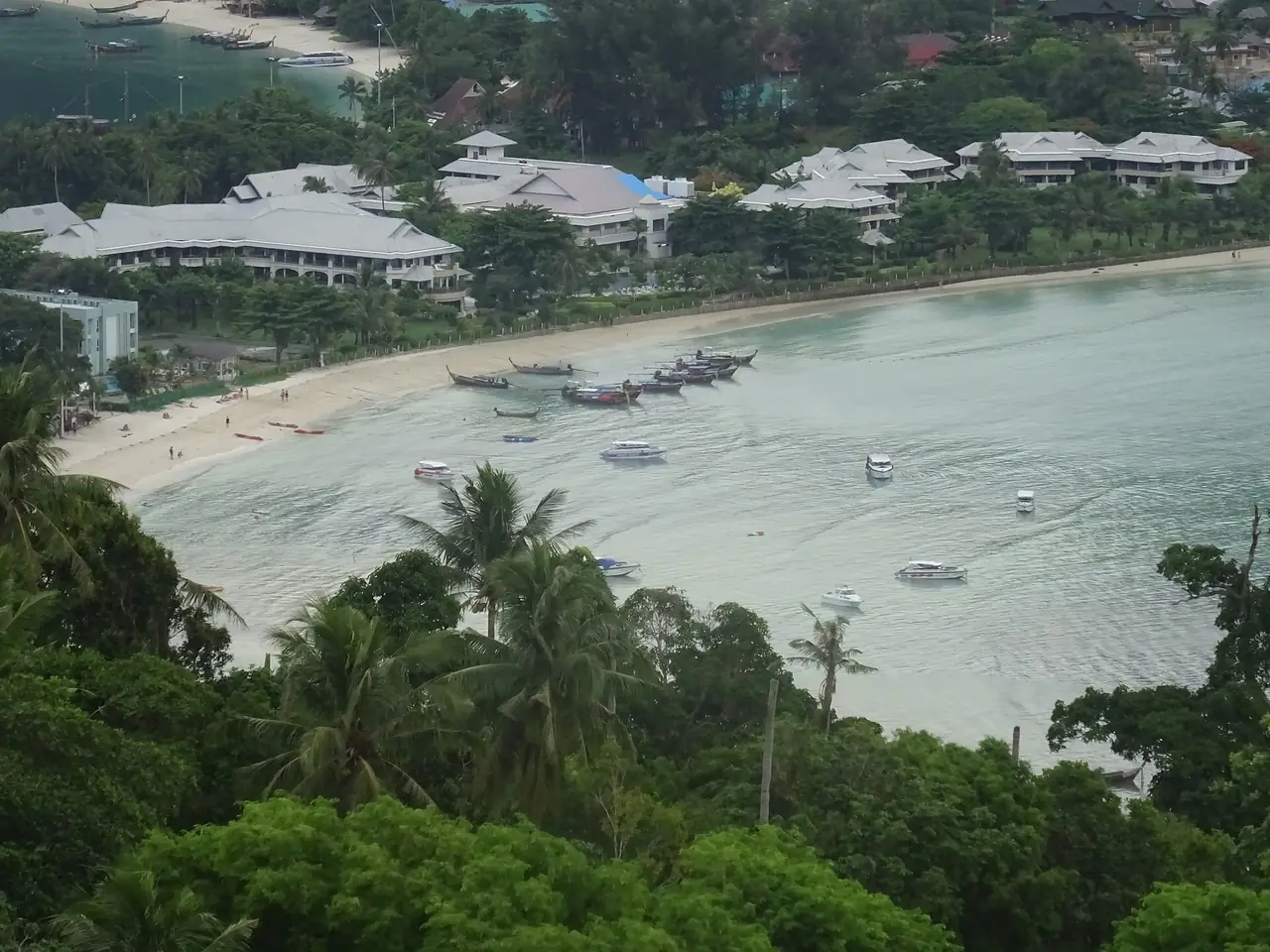 Loh Dalum Bay seen from the viewpoint above Phi Phi Don, with hotels along the beach