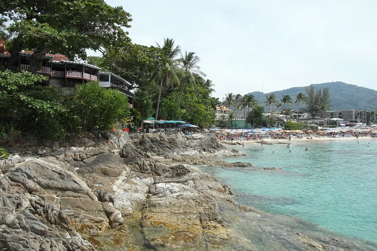 A rocky cove and beach at Patong on Phuket's west coast, from where many visitors travel to the park