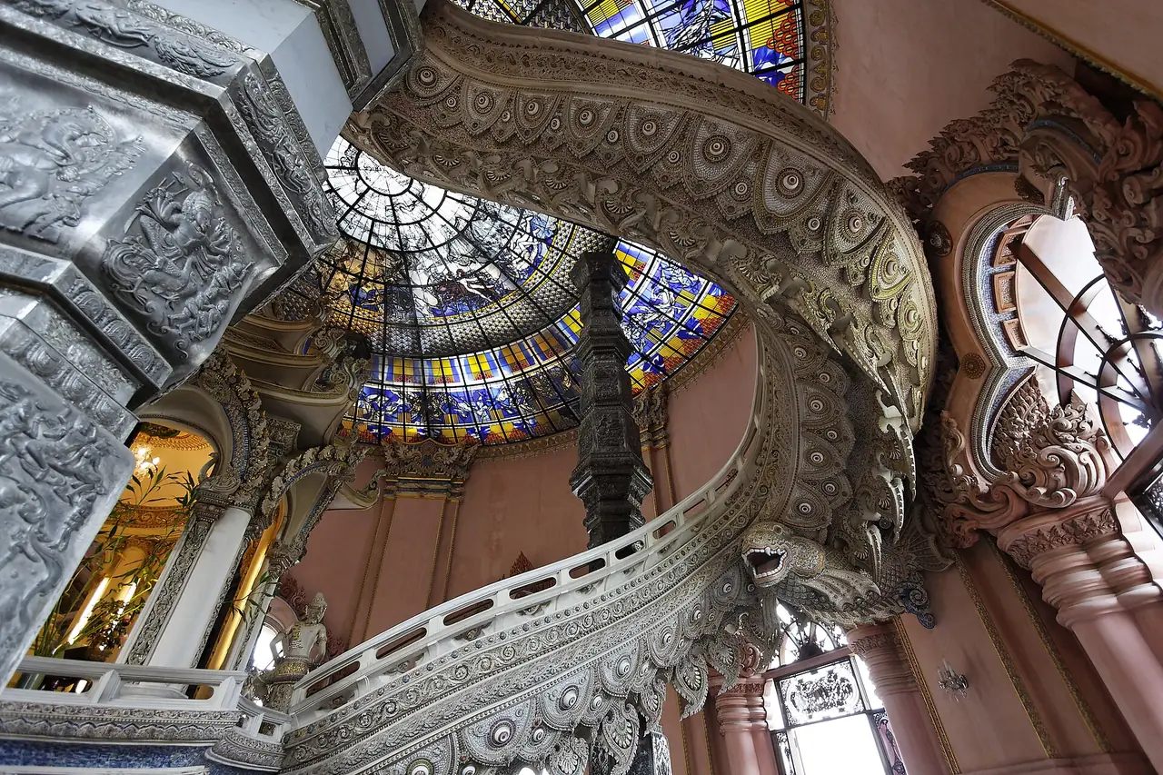 Spiral staircase and stained-glass dome inside the Erawan Museum